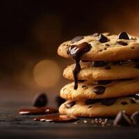 Delicious homemade chocolate chip cookies stacked on a wooden table with melted chocolate photo