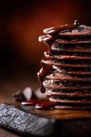 Decadent chocolate cookies stacked high with rich chocolate drizzle photo