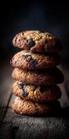 Delicious stacked cookies on a rustic wooden table in warm lighting photo