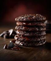 Delicious stacked chocolate cookies with melted chocolate drizzle on a wooden surface photo