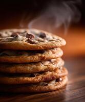 A stack of chocolate chip cookies with smoke coming out of them photo