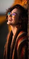 Joyful smile of a young woman enjoying sunset at a rural location photo