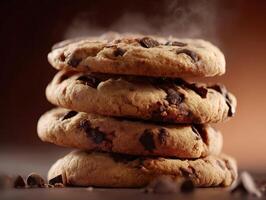 Warm baked chocolate chip cookies stacked on a wooden table in cozy setting photo