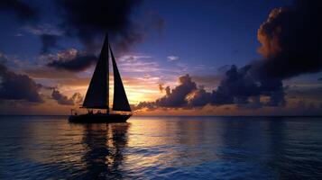 Sailing into the sunset with vibrant clouds reflecting on tranquil water photo