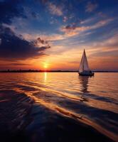 Sailboat gliding across tranquil waters during vibrant sunset photo