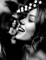 A black and white photo of a man and woman