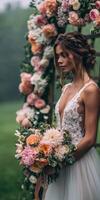 Bride posing elegantly in floral setting during wedding ceremony photo