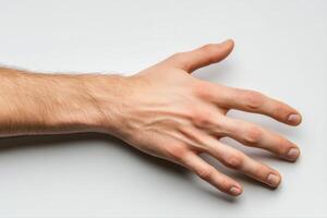 Close-up of a human hand with visible veins against a plain background, showcasing anatomy photo