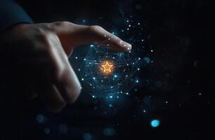 A hand reaching towards a glowing star within a digital network, symbolizing innovation photo