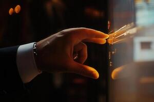 Elegant hand interacting with a touchscreen display, showcasing technology in a modern setting photo