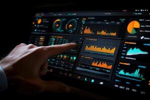 User interacting with a digital dashboard displaying analytics and performance metrics photo