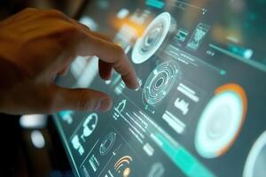 User interacting with a futuristic touchscreen interface displaying data analytics and graphics photo