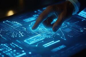 Hand interacting with a futuristic touchscreen displaying complex digital data and graphics photo