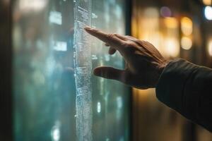 Person interacting with a digital display, exploring information in a modern environment photo