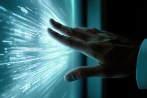 Human hand reaching towards a glowing digital interface, showcasing futuristic technology photo
