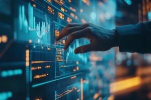 Futuristic hand interacting with glowing data visualizations in a high-tech environment photo