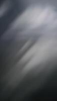 Soft light and shadow patterns on dark surface video
