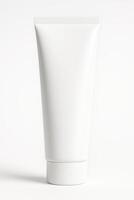 White Cylindrical Plastic Tube With Screw Cap on Smooth Surface in Studio Lighting, High Resolution Image for Product Design and Branding photo