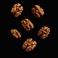 Walnuts Falling on Black Background Capturing Healthy Breakfast Ingredients in Dynamic Motion and Minimalist Design for Modern Food Photography photo