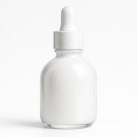 White Opaque Glass Bottle with Dropper Cap for Facial Serum in High Gloss Finish on Clean Isolated Background photo