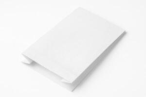 White Paper Bag for Bread in Perspective View on Textured Surface with Studio Lighting and Clean Background photo