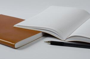 Leather Cover Notebook on White Background photo