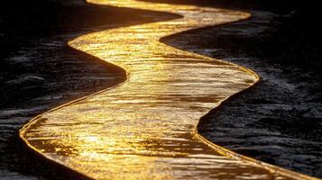 A long yellow stream of water running through the mud photo