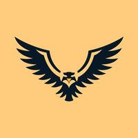 An eagle logo with black wings on a yellow background vector