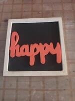 The Word HAPPY in Orange Letters on a Black Background with a White Frame photo