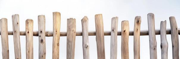 Old wooden fence isolated on a white background photo