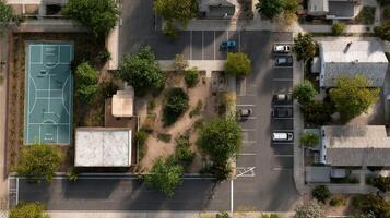 An overhead view of a quiet neighborhood block where small s of players engage in themed scavenger hunts utilizing mobile devices to uncover hidden clues and prompts that bridge thei photo