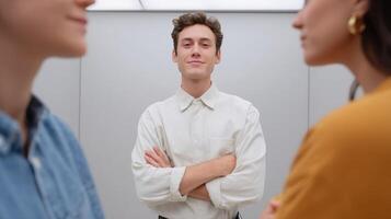 A participant stands confidently at the center of a modern publicspeaking booth interacting with AGI avatars who portray skepticism and critique through crossed arms and raised eyebrow photo