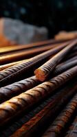Rust-covered metal rods close-up. Stacked, textured rebar photo