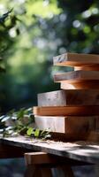 Stacked wooden planks in a garden setting. Sunlight highlights the natural wood grain photo