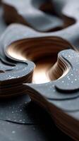 Abstract layered shapes in dark tones with light highlights. Detailed, textured, and intricate design photo