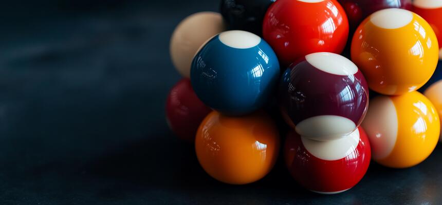 Billiard balls stacked in a pyramid