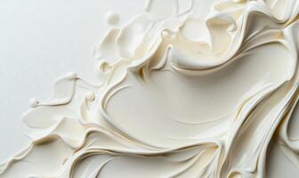 A close up of a white liquid with swirls photo