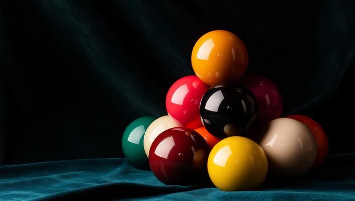 Pool balls pyramid on teal cloth
