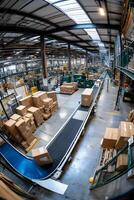 High-angle view of a factory conveyor belt system moving cardboard boxes through an industrial facility. Numerous boxes stacked and on the conveyor. Machines and equipment are visible photo