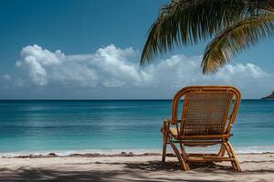 Tranquil Beach with Empty Bamboo Chair Under Palm Shade Overlooking Ocean photo