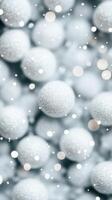 Silver christmas ball winter decoration with falling snow effect creates a festive holiday ornament atmosphere. Abstract background photo