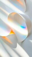Crystal display stands reflecting iridescent rainbow surface, on glossy light creating contemporary minimalist visual composition. Abstract background photo