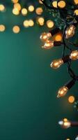 Warm atmosphere. bulbs hanging against a green backdrop, evoking a festive holiday light Abstract background photo