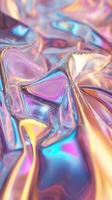 Holographic iridescent surface is creating a colorful abstract background with texture. Abstract background photo