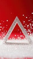 Silver glitter christmas effect, decoration sparkling on red background with bokeh tree creating festive holiday atmosphere. Abstract background photo