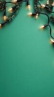 Warm light bulbs hanging against a green backdrop, evoking a festive holiday atmosphere. Abstract background photo