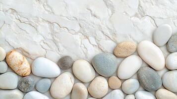 Pastel pebbles forming serene border along textured marble surface, design wellness and relaxation with minimalist representing inspired zen photo