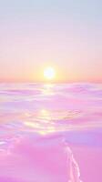 Soft pink ocean mirroring golden sunset, radiating serene tranquility luminescence against twilight horizon photo