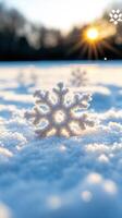 Soft snowflakes drifting onto frosted branches, golden light transforming wintry landscape into serene, enchanting scene photo