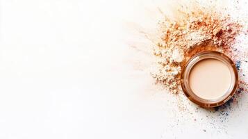 Brown powder exploding a a white background, creating on colorful cloud with particles of different sizes photo